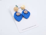 Load image into Gallery viewer, Blue Floral Dangle Earrings with Charm – Elegant &amp; Feminine
