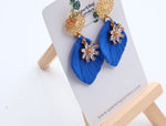 Load image into Gallery viewer, Blue Floral Dangle Earrings with Charm – Elegant &amp; Feminine
