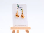 Load image into Gallery viewer, Croissant Dangle Earrings
