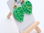 Load image into Gallery viewer, Tropical Leaf Silhouette Dangle Earrings
